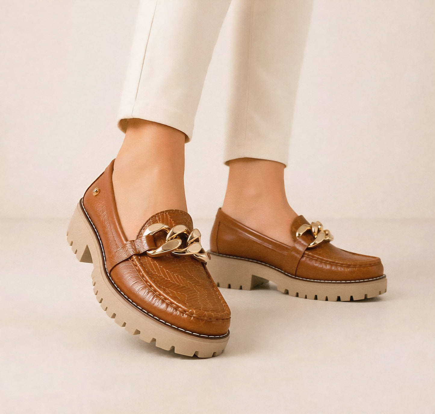 Women's cognac embossed leather loafer with gold chain detail and lightweight platform by MonikCreations.