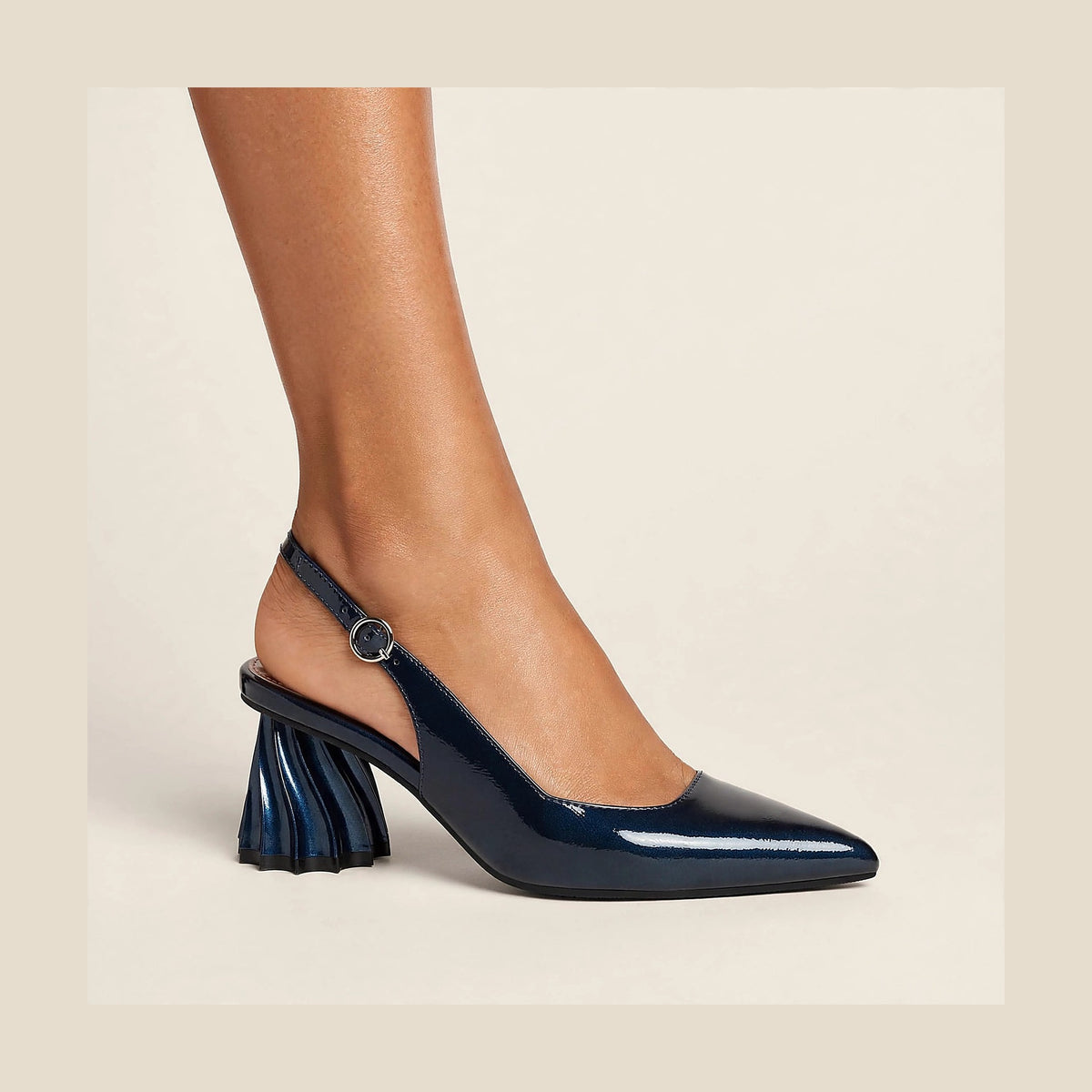 Gala Sculpted Slingback in Navy - patent slingback with sculptural heel, worn on foot