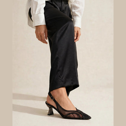Lumière Mesh Slingback in black - sheer mesh slingback pump with crystal toe cap, worn on foot